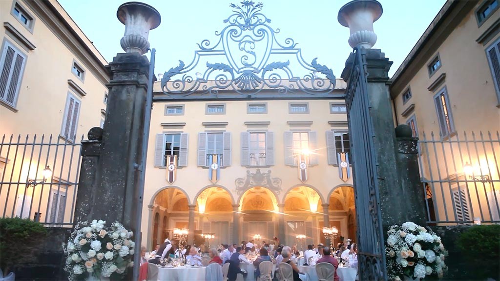 Tuscany wedding video: A view of Villa Le Molina, Lucca during the wedding reception.